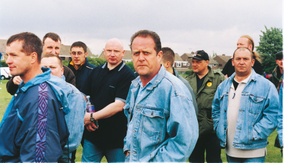 group of men from performance the battle of orgreave by jeremy deller